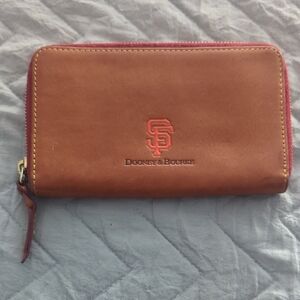 Dooney & Bourke Brown Leather Zip-Around Wallet with Red Trim